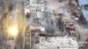 Украинский танк ведет огонь в городе Соледар Донецкой области. Скриншот из видео, опубликованного Государственной пограничной службой Украины 8 января 2023 года